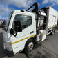 White garbage truck with a yellow stripe on a street